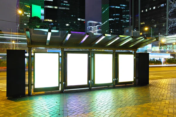 Blank billboard in city at night — Stock Photo, Image