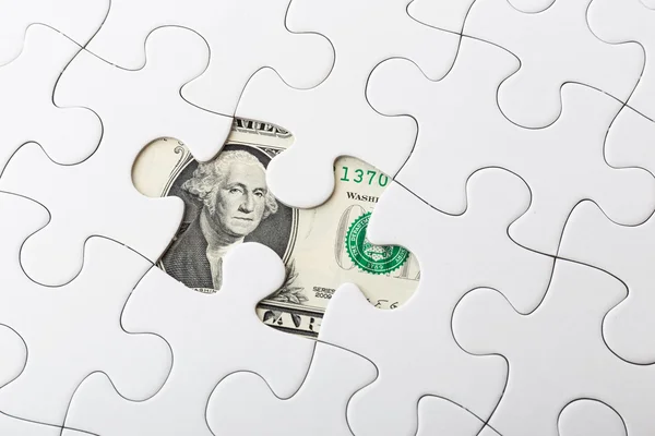 Fehér puzzle, és nekünk bankjegy — Stock Fotó