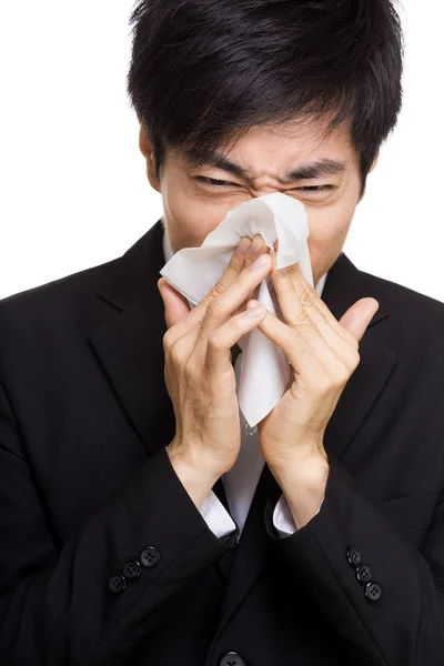 Asian businessman sneeze — Stock Photo, Image