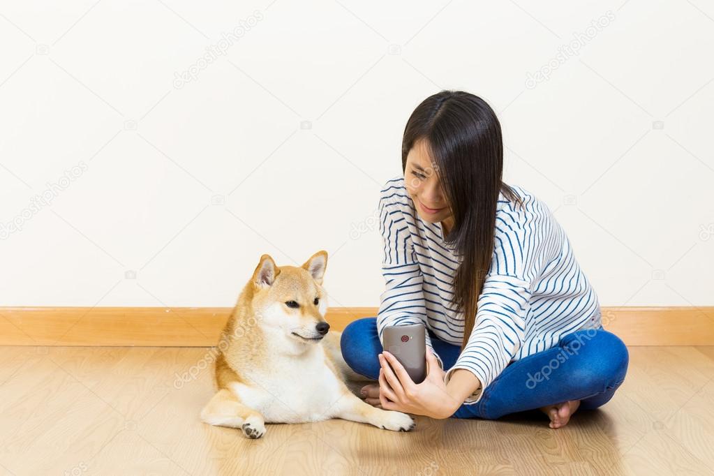 Asia woman and dog selfie