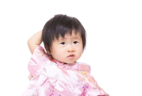Chinese little girl scratch her head — Stock Photo, Image