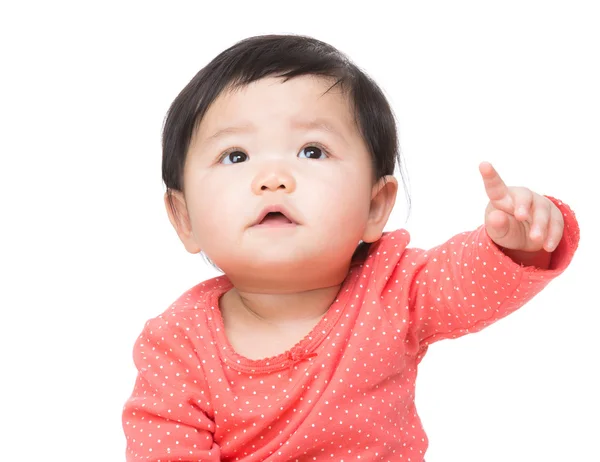 Asiatiska baby flicka finger pekar mot — Stock fotografie