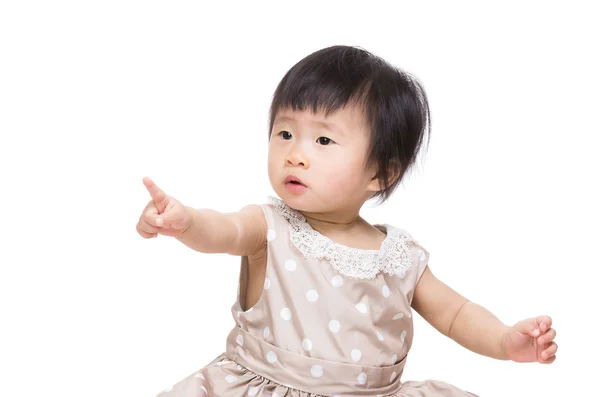 Asiático bebê menina sentado e dedo apontando frente — Fotografia de Stock
