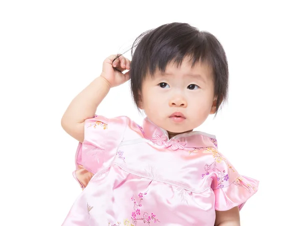 Chinese little girl touch her hair — Stock Photo, Image