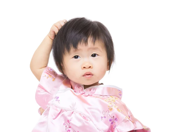Little girl scratching her head — Stock Photo, Image