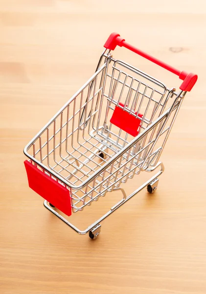 Trolley on wooden background — Stock Photo, Image