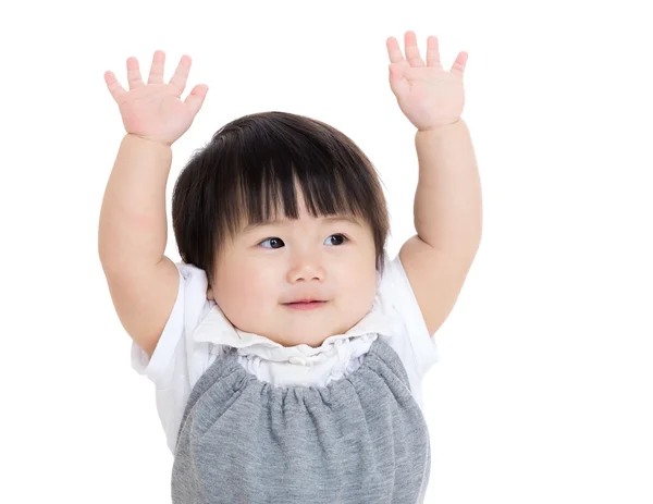 Aziatische babymeisje met opgeheven handen omhoog — Stockfoto