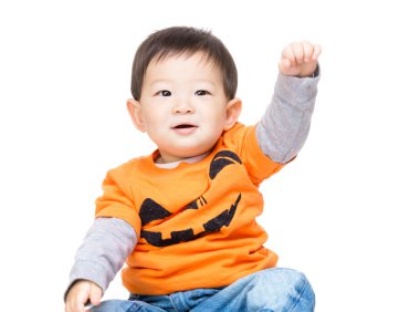 Asian baby boy with halloween dressing and hands up clipart