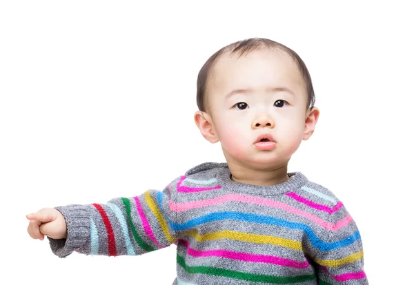 Asiático bebé chico apuntando a un lado —  Fotos de Stock