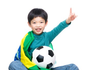Asya ufaklikla Brezilya bayrağı ve futbol topu