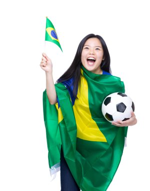 Asyalı kadın futbol meraklısı topu ve bayrak