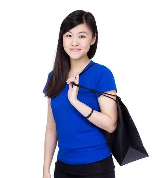 Asian woman with shopping bag Royalty Free Stock Images