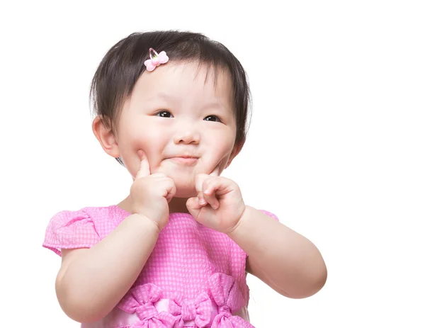 Asian baby girl touch her face with  two fingers — Stock Photo, Image