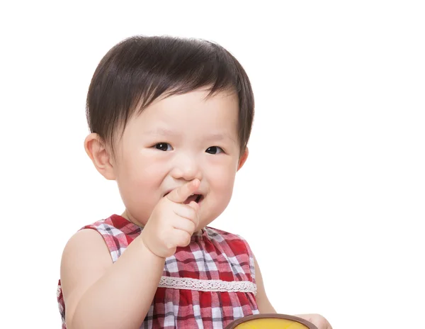 Asiatiska baby flicka finger pekar mot — Stockfoto