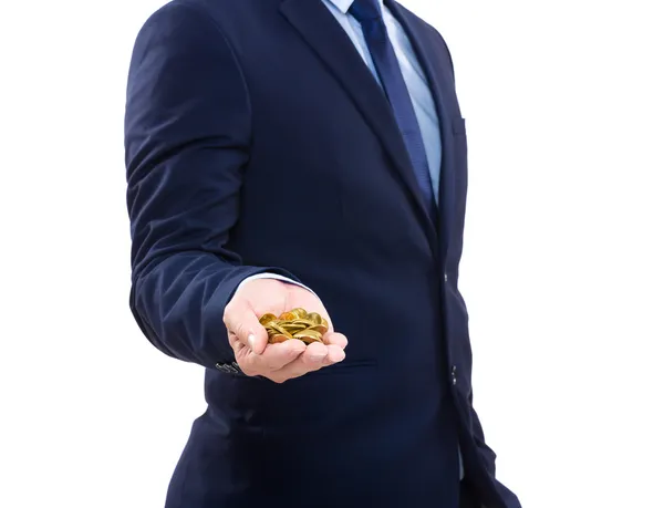 Businessman holding gold coin — Stock Photo, Image