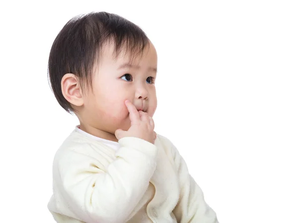 Asian baby girl suck finger into mouth — Stock Photo, Image