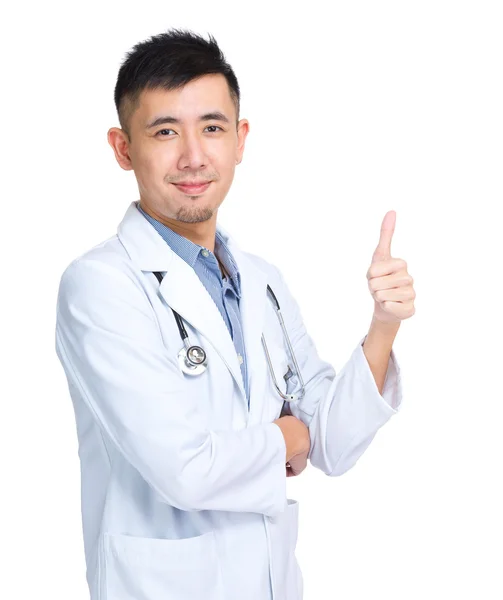 Friendly doctor smiling giving thumb up — Stock Photo, Image