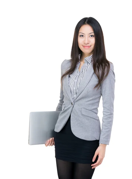 Asian businesswoman holding laptop — Stock Photo, Image