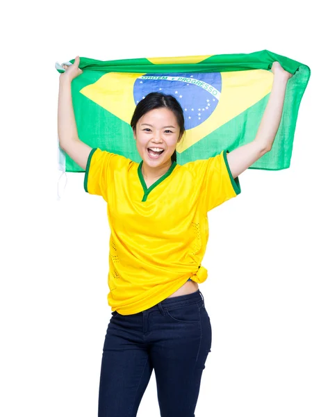 Aziatische vrouwelijke voetbalfans houden Brazilië vlag — Stockfoto