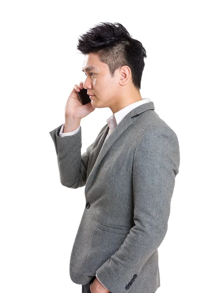 Biznesmen mówić do mobilnych — Zdjęcie stockowe