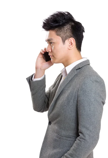 Asian businessman talking to mobile — Stock Photo, Image