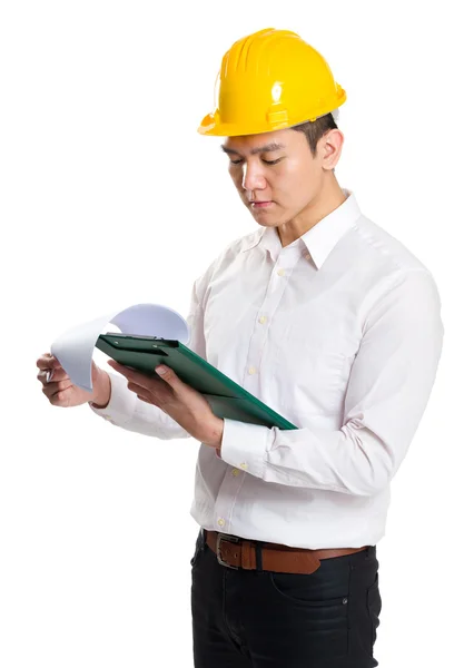 Young contractor with hardhat and clipboard — Stock Photo, Image