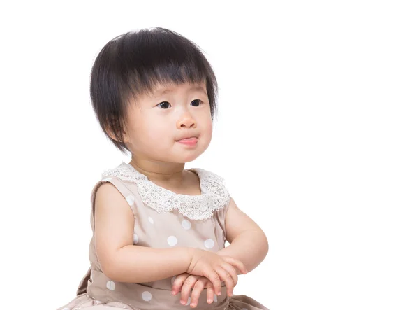 Asia baby girl lick sticking out — Stock Photo, Image