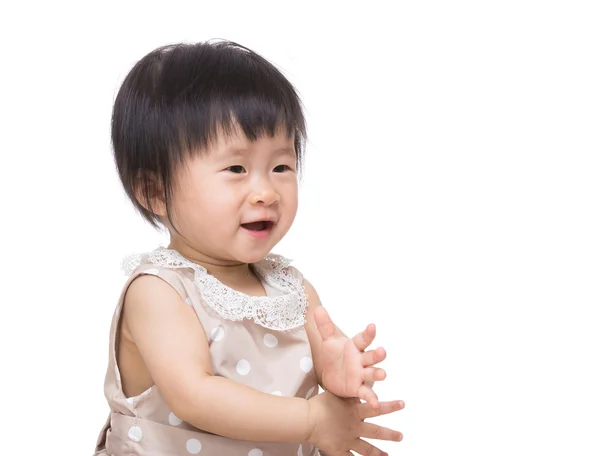 Aziatische babymeisje klappen hand — Stockfoto