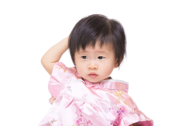 Chinese baby girl touching her head — Stock Photo, Image