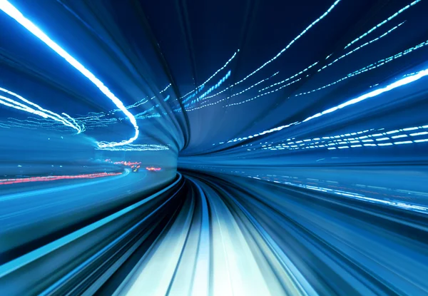 Train moving fast in tunnel — Stock Photo, Image