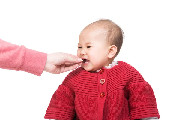 Asian baby girl feeding with snack — Φωτογραφία Αρχείου