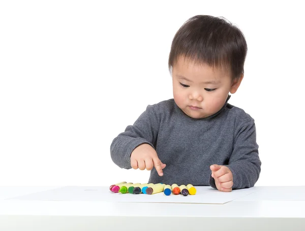 Little boy choosing color — Stock Photo, Image