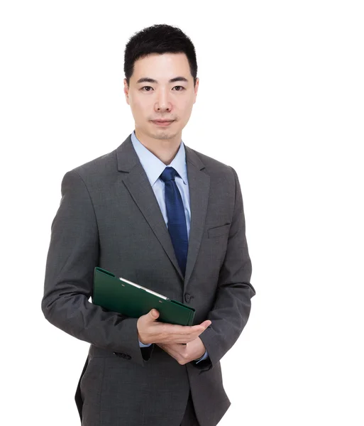 Asian businessman holding clipboard — Stock Photo, Image