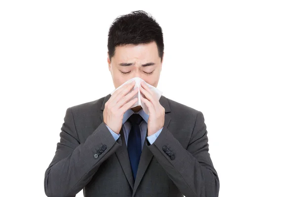 Asian businessman sneeze — Stock Photo, Image