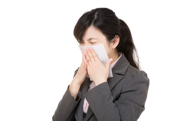 Asian businesswoman sneeze — Stock Photo, Image