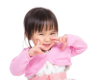 Asyalı küçük kız olun komik surat