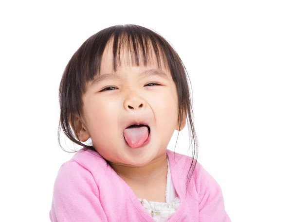 Asian little girl lick sticking out — Stock Photo, Image