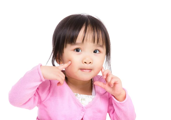 아시아 소녀는 그녀의 얼굴을 터치 — 스톡 사진