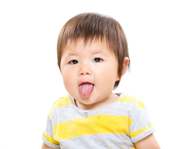 Baby girl with lick sticking out — Stock Photo, Image