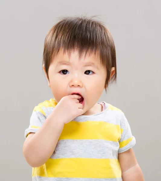Little girl eating snack — Stock Photo, Image