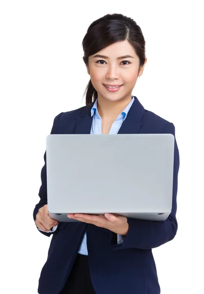 Businesswoman holding laptop — Stock Photo, Image