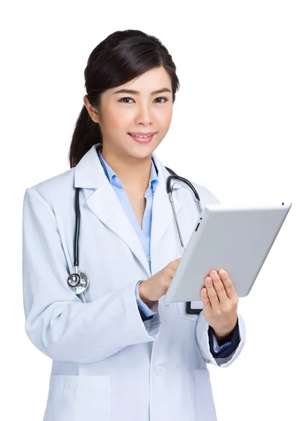 Asian doctor using digital table — Stock Photo, Image