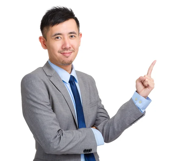 Handsome businessman pointing up with finger — Stock Photo, Image