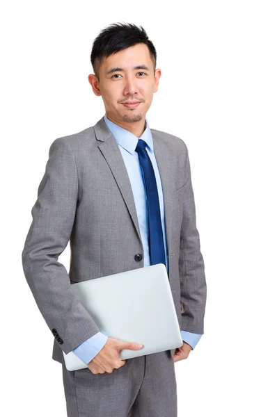 Businessman holding laptop computer — Stock Photo, Image