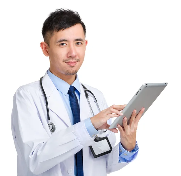 Doctor working on digital tablet — Stock Photo, Image