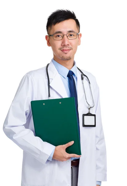 Young doctor holding with clipboard — Stock Photo, Image