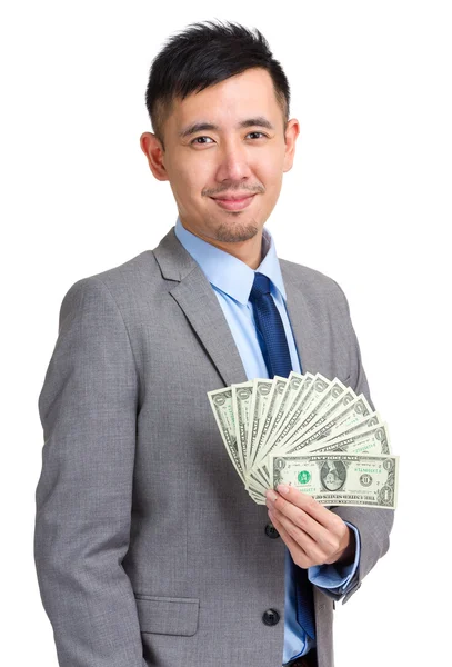 Geschäftsmann mit Dollarscheinen — Stockfoto