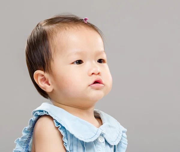 Baby girl looking at aside — Stock Photo, Image