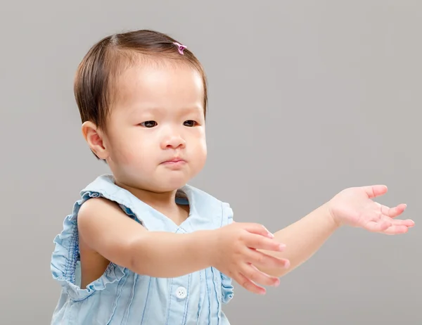 Little girl pulling hand up — Stock Photo, Image