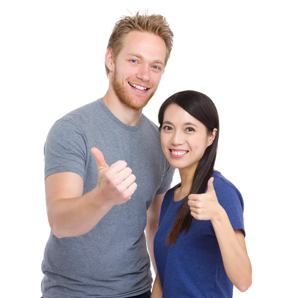 Friendship of caucasian and asian with thumb up — Stock Photo, Image